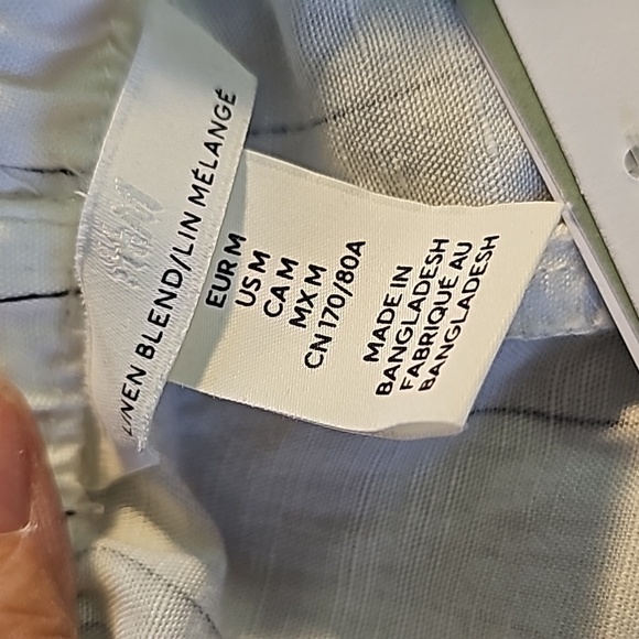 H&M, NWT wide leg white with pinstripe. Size medium. Elastic‎ waist with tie. - Picture 4 of 8